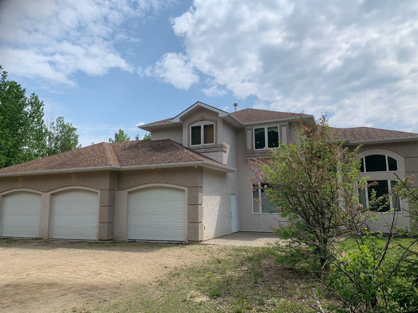 Property Photo: 29 594028 Range Road 125 AB T7S 1P1