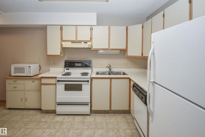 Property Photo:  4812 51 Avenue 102  AB T7Z 1P7 