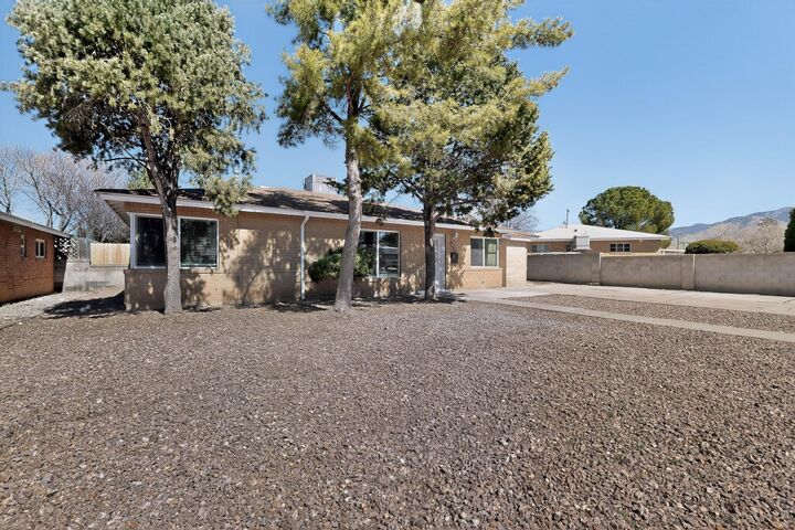 Property Photo: 8715 Claremont Avenue NE NM 87112
