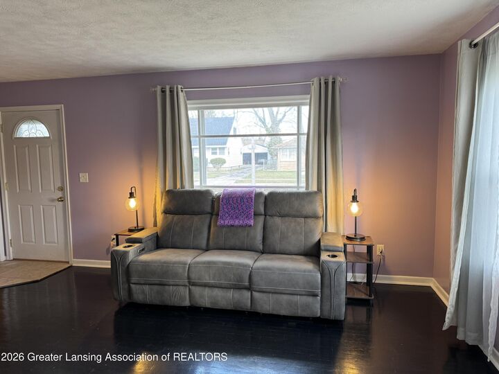 Property Photo:  1703 Holly Way  MI 48910 