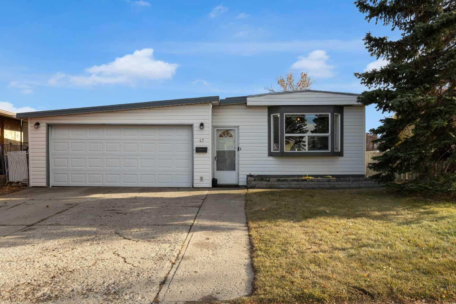 Property Photo:  47 Huntstrom Drive NE  AB T2K 5T4 
