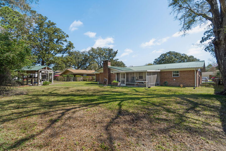 Property Photo:  653 NE Golf Course Drive  FL 32547 