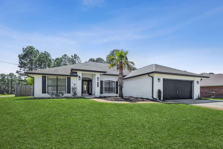 Property Photo:  6693 Indian Street  FL 32566 