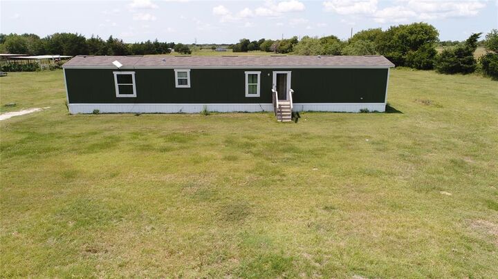 Property Photo: 14200 County Road 2180 TX 76681