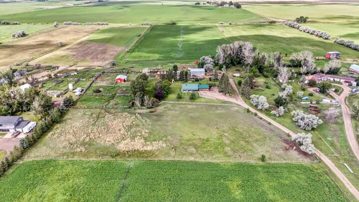 Property Photo: 12228 Range Road 64 AB T1A 7G5