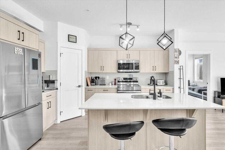 Property Photo: 30 Sage Hill Walk NW 305 AB T3R 2A9
