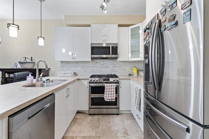 Property Photo:  8538 203A Street 206  BC V2Y 3P9 