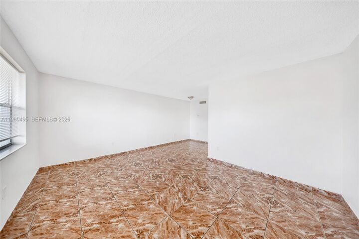 Property Photo:  301 NW 177th St 201  FL 33169 