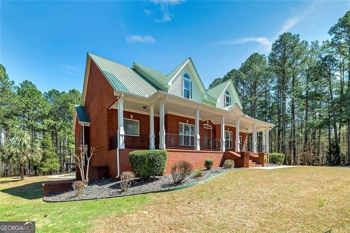 Property Photo:  4860 Peeksville Road  GA 30252 