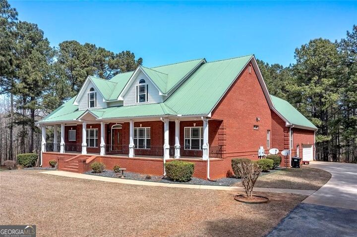 Property Photo:  4860 Peeksville Road  GA 30252 