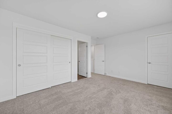 Property Photo: 132 Red Embers Link NE 908 AB T3N 2X8