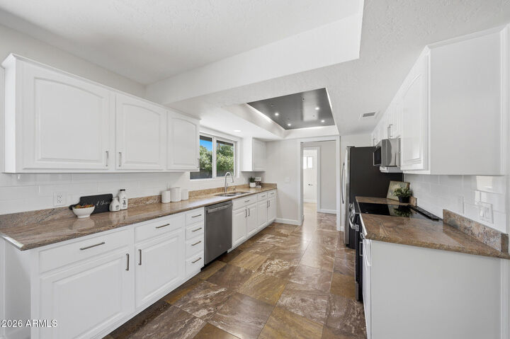 Property Photo:  5610 E Charter Oak Road  AZ 85254 