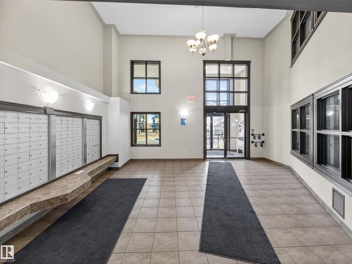 Property Photo: 9363 Simpson Drive NW 1111 AB T6R 0N2