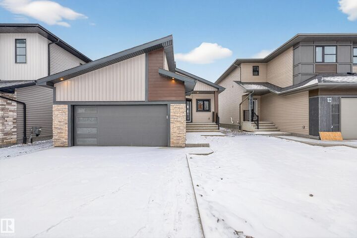 Property Photo: 7093 Kiviaq Crescent SW AB T6W 5N7