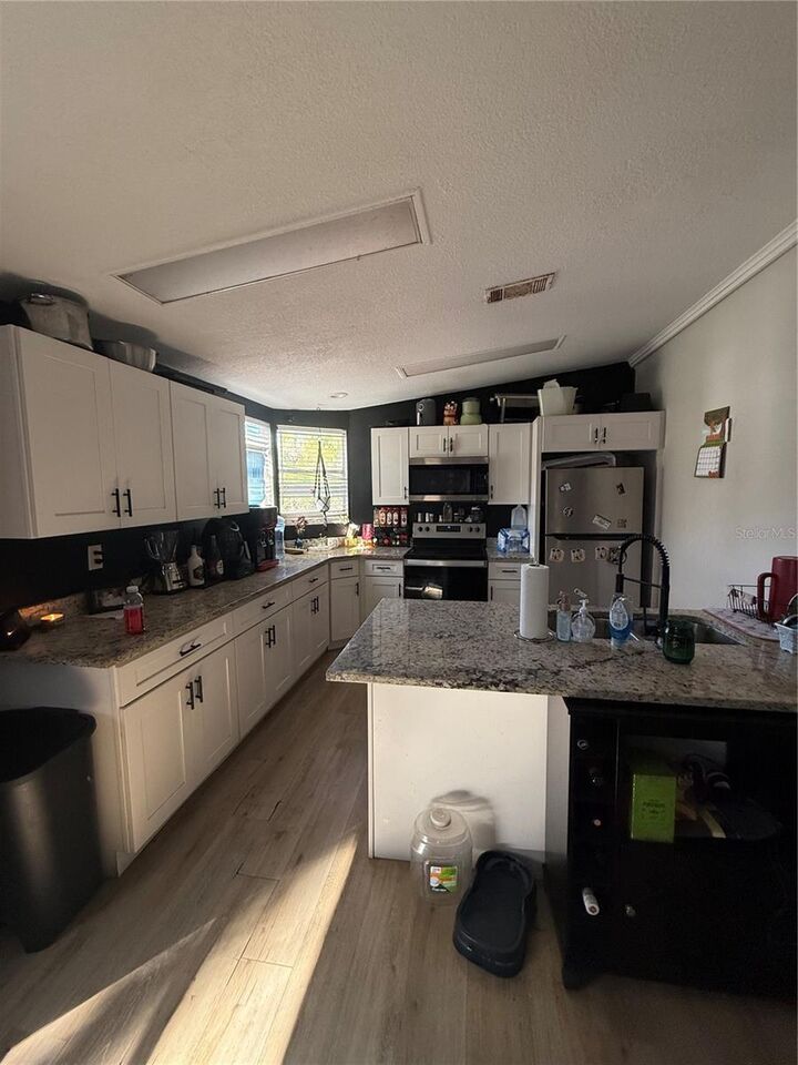 Property Photo:  8602 Treasure Island Road  FL 34788 