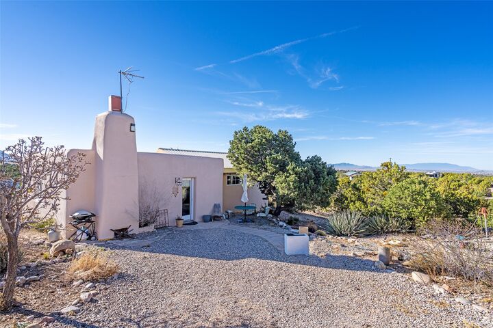 Property Photo:  24 & 26 Calle Pia Tixier  NM 87507 