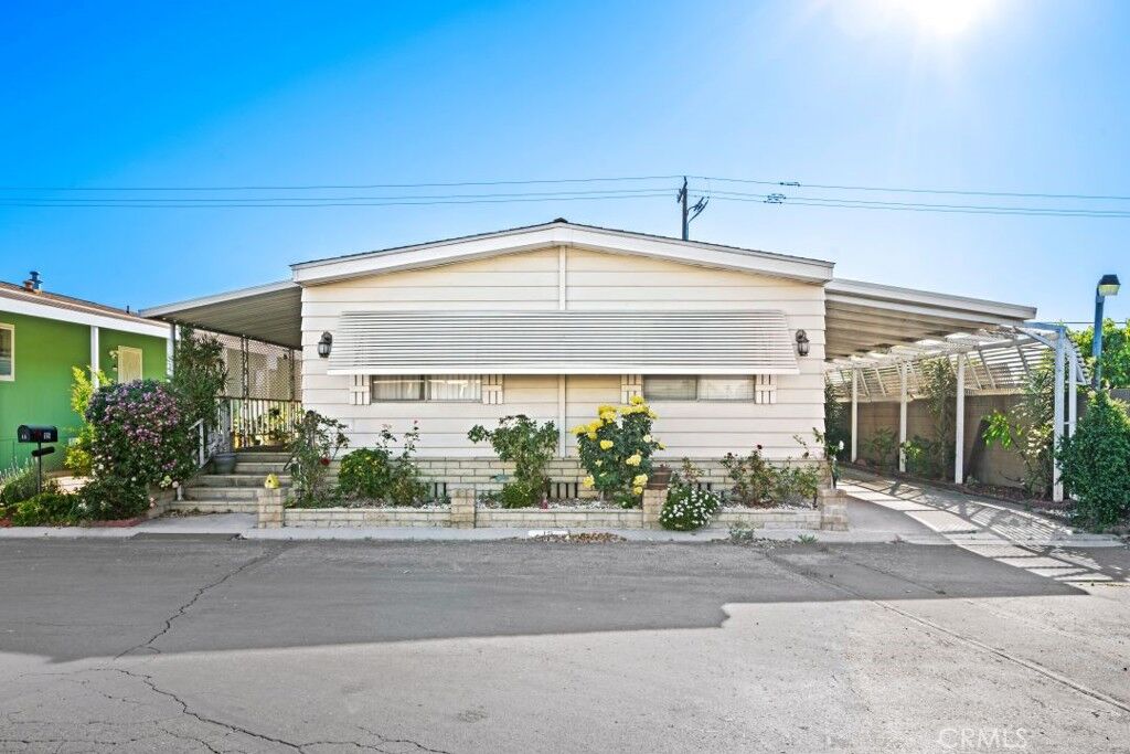 Property Photo:  6741 Lincoln 15  CA 90620 