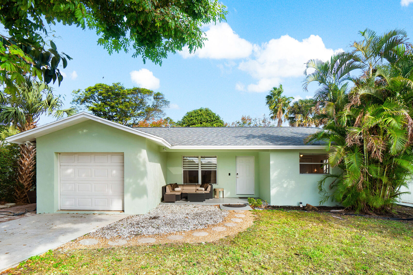 Property Photo:  411 SW 1st Avenue  FL 33435 