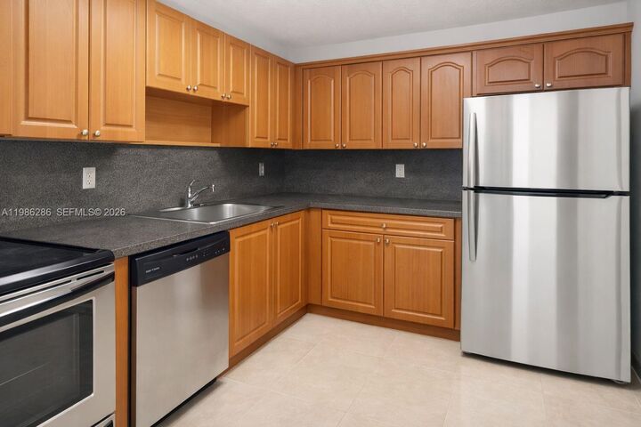 Property Photo:  15620 SW 80th St H-304  FL 33193 