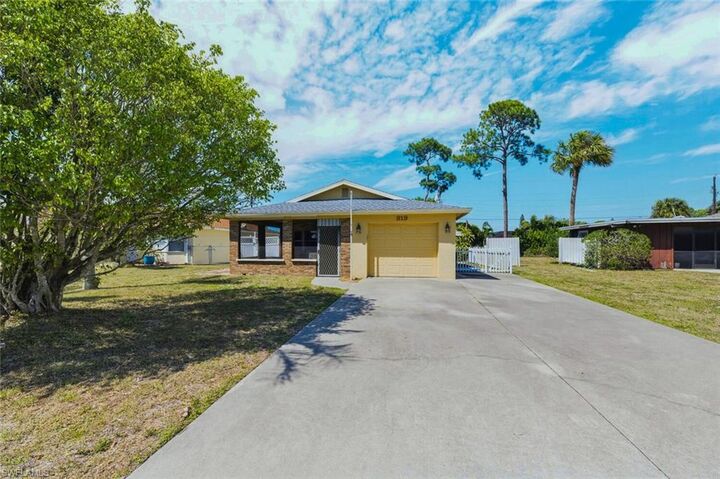 Property Photo:  819 98th Ave N  FL 34108 