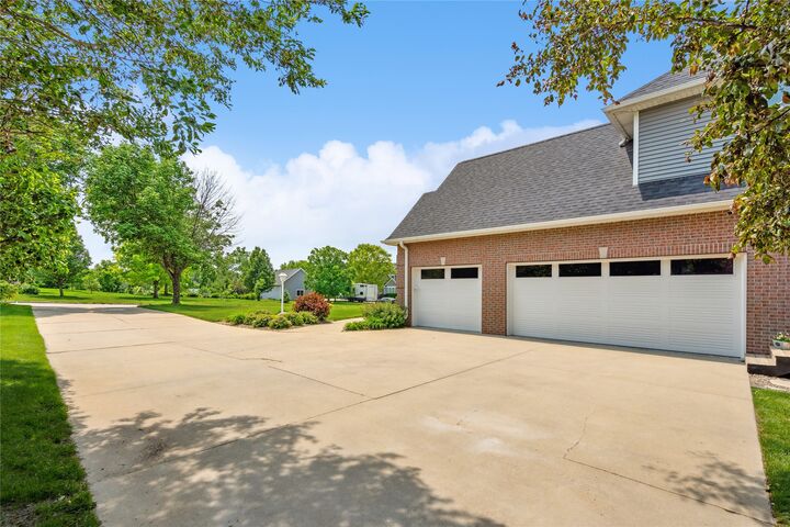 Property Photo:  11875 NW Oaktree Drive  IA 50111 