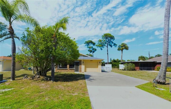 Property Photo:  819 98th Ave N  FL 34108 