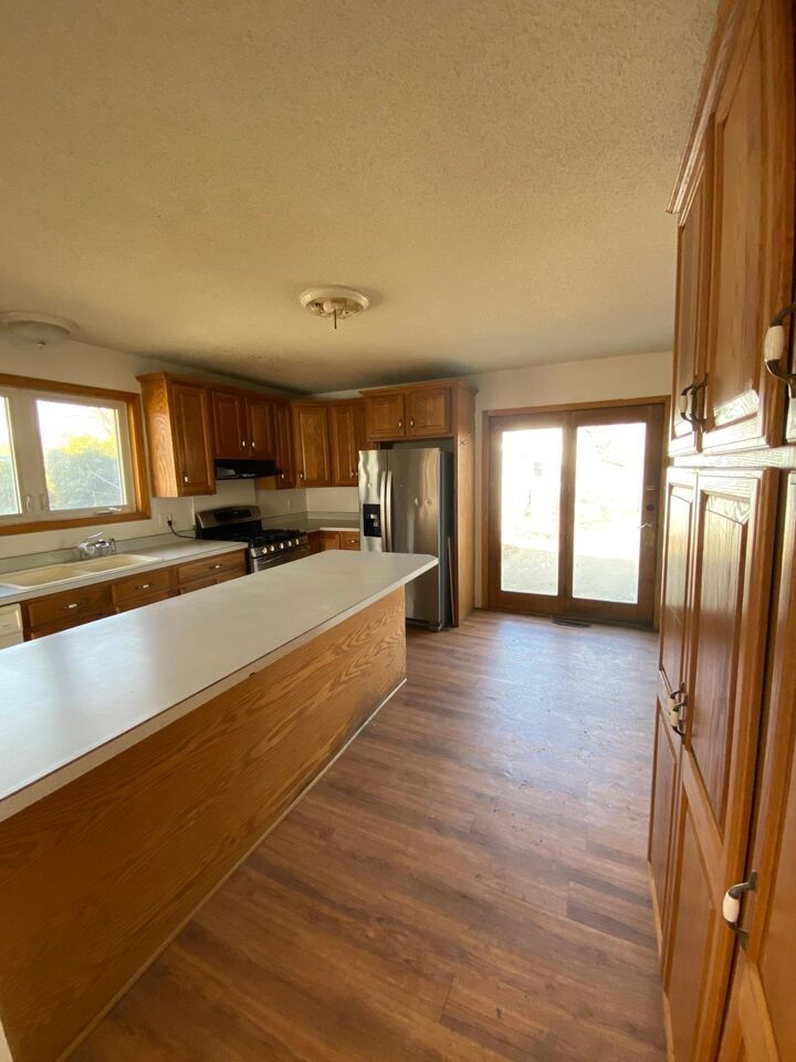 Property Photo:  1115 6th Avenue E  MN 56308 