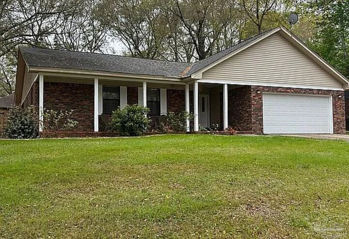 Property Photo:  10011 Hollowbrook Dr  FL 32514 