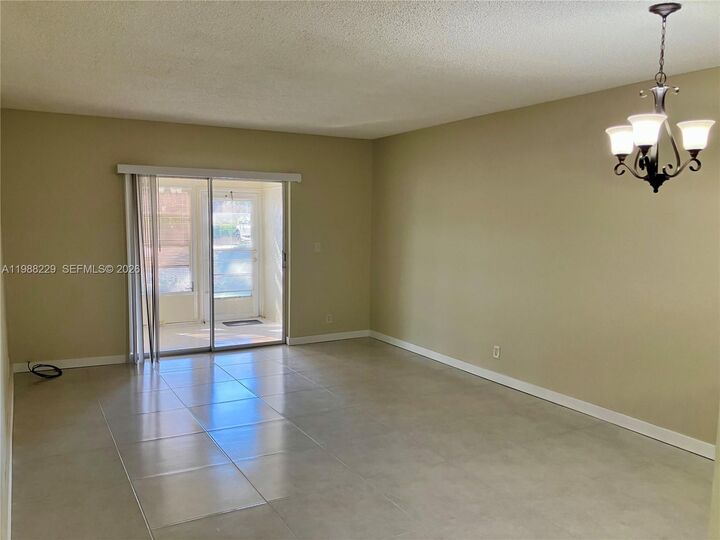 Property Photo:  5681 SW 2nd Ct 105  FL 33068 