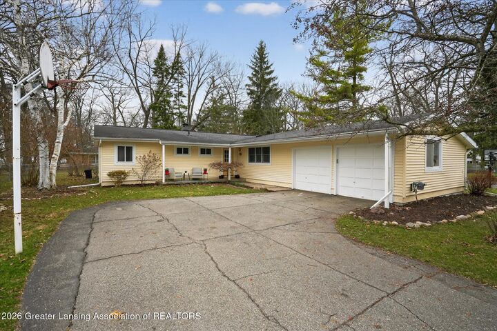 Property Photo:  4415 Elmwood Drive  MI 48864 