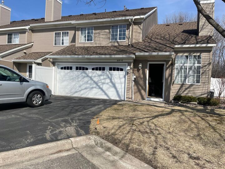 Property Photo:  610 85th Lane NW 8nw  MN 55433 