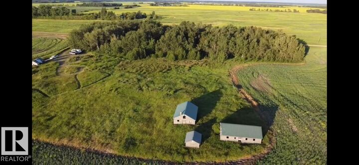 Property Photo:  Township Rd 582 Range Rd 205  AB T0A 2V0 