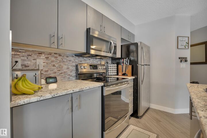 Property Photo:  11453 Ellerslie Road SW 110  AB T6W 1T3 