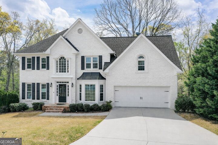 Property Photo:  4910 Red Robin Ridge  GA 30022 