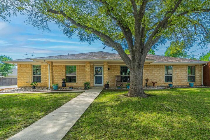 Property Photo: 210 Bexar Drive TX 75077