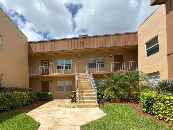 Property Photo:  465 Flanders J  FL 33484 