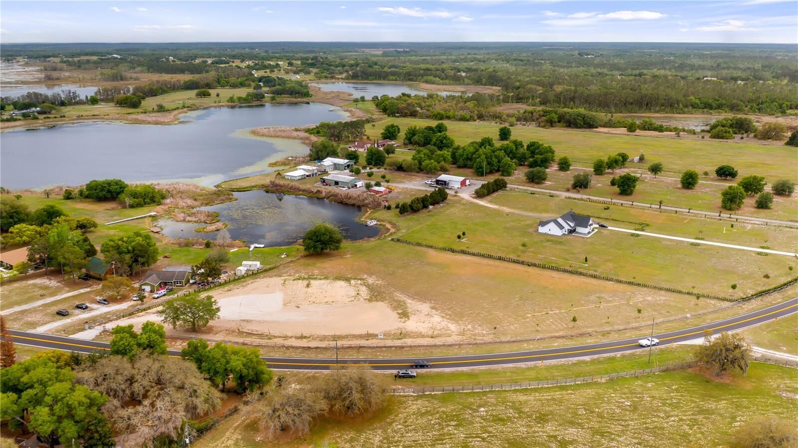 Property Photo:  County Road 561  FL 34711 