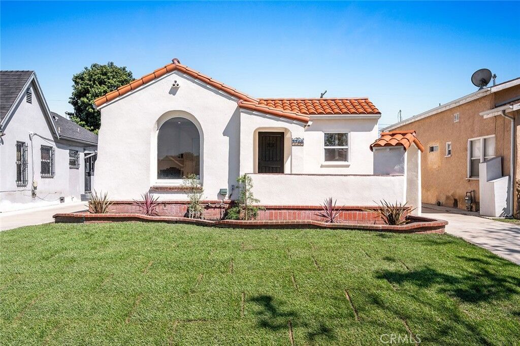 Property Photo:  7700 Brighton  CA 90047 
