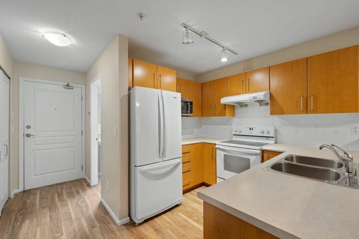 Property Photo:  3388 Morrey Court 312  BC V3J 7Y5 