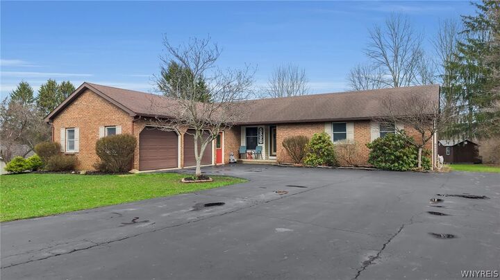 Property Photo:  5566 Homestead Road  NY 14075 