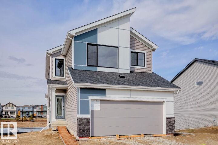 Property Photo: 2322 Egret Way NW AB T6M 3G8