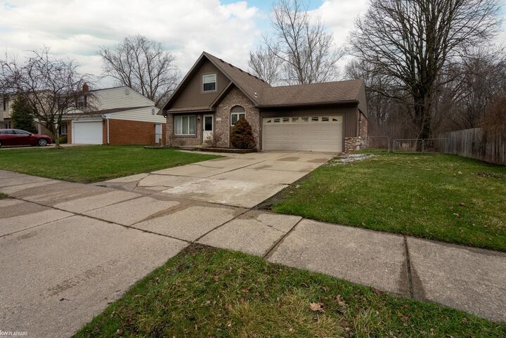Property Photo:  33153 Palmetto Drive  MI 48047-1428 