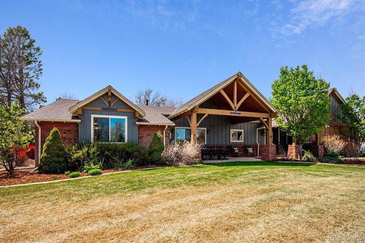 Property Photo: 8830 W Bear Creek Drive CO 80227
