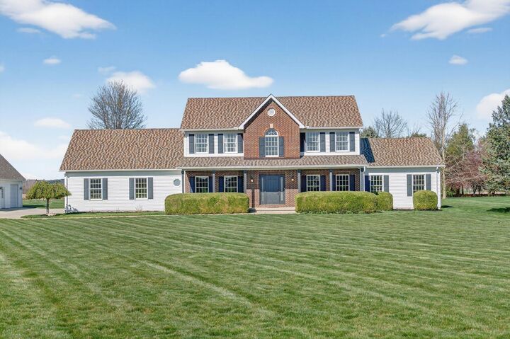 Property Photo: 4645 Meadowgrove NW Drive OH 43112