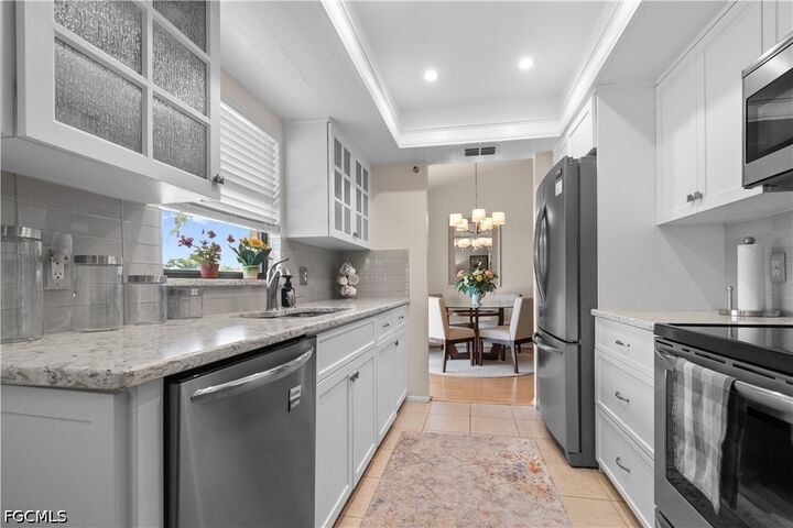 Property Photo:  8595 Charter Club Circle 8  FL 33919 