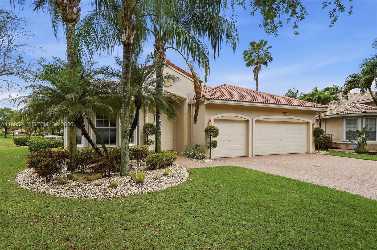 Property Photo:  5936 NW 54th Cir  FL 33067 