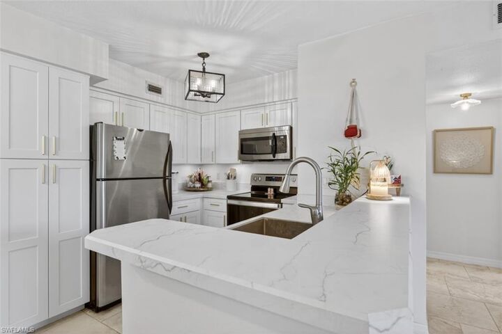 Property Photo:  13575 Eagle Ridge Dr 1214  FL 33912 