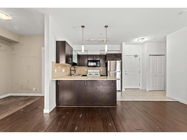 Property Photo:  33545 Rainbow Avenue 111  BC V2S 1Z6 