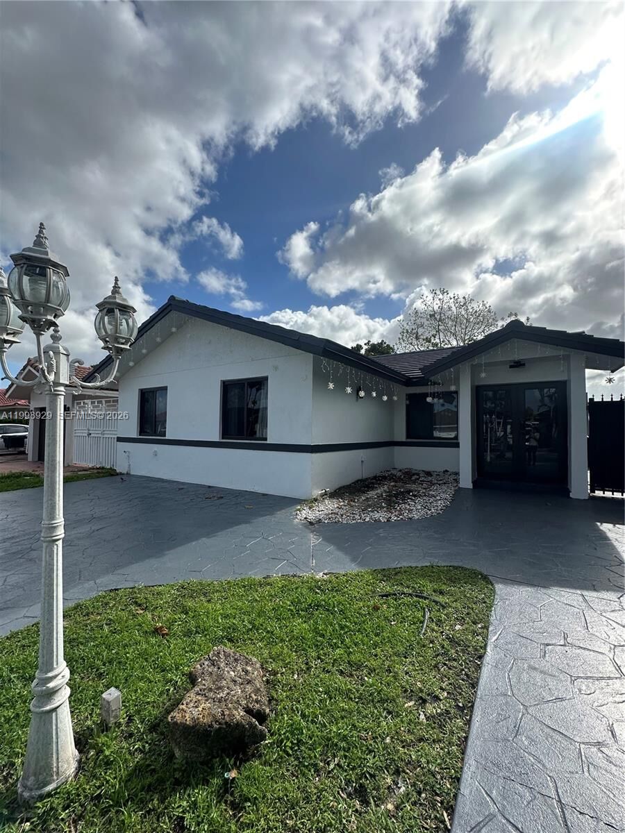 Property Photo:  5923 SW 147th Pl  FL 33193 