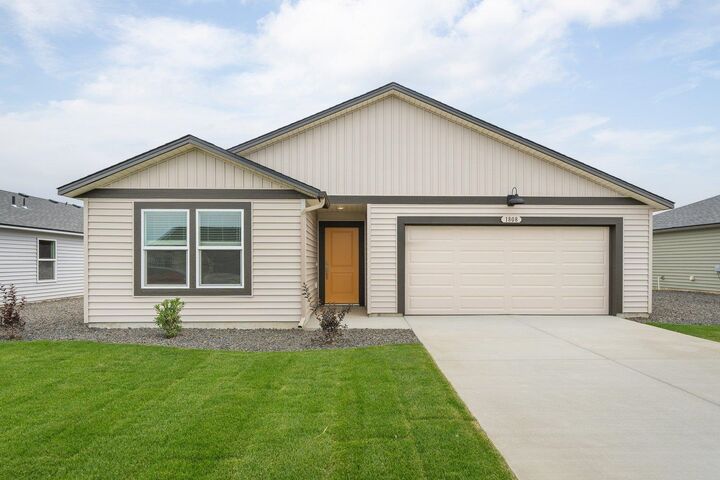 Property Photo:  1808 E Boskoop St  WA 99006 